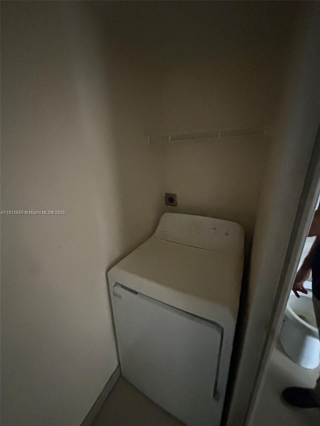 2333 Caroma Ln Unit 1, West Palm Beach, FL 33415 - laundry room with washer / clothes dryer