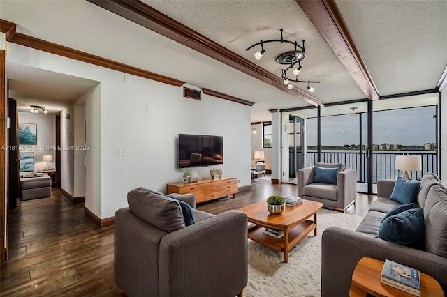 106 Lake Emerald Dr Unit 210, Oakland Park, FL 33309 - living area with wood-type flooring, a textured ceiling, baseboards, a wall of windows, and crown molding