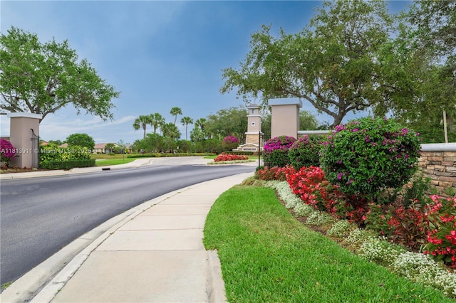 9722 SW Glenbrook Dr, Port St Lucie, FL 34987 - view of asphalt street with sidewalks and curbs
