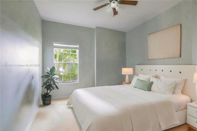 9722 SW Glenbrook Dr, Port St Lucie, FL 34987 - carpeted bedroom with baseboards and a ceiling fan