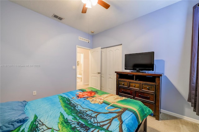 9722 SW Glenbrook Dr, Port St Lucie, FL 34987 - bedroom featuring light colored carpet, a closet, baseboards, and ceiling fan