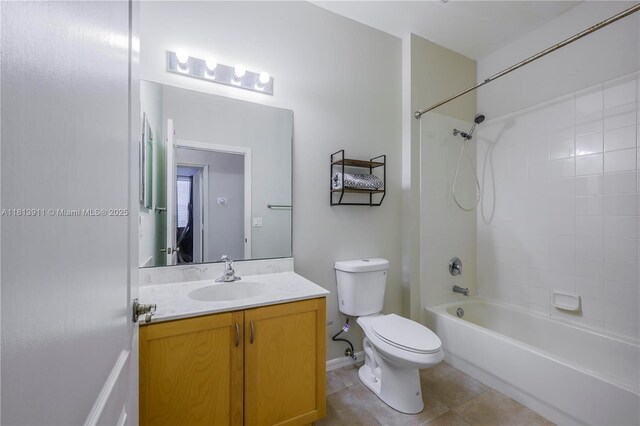 9722 SW Glenbrook Dr, Port St Lucie, FL 34987 - full bath with tile patterned floors, toilet, vanity, and shower / bathtub combination
