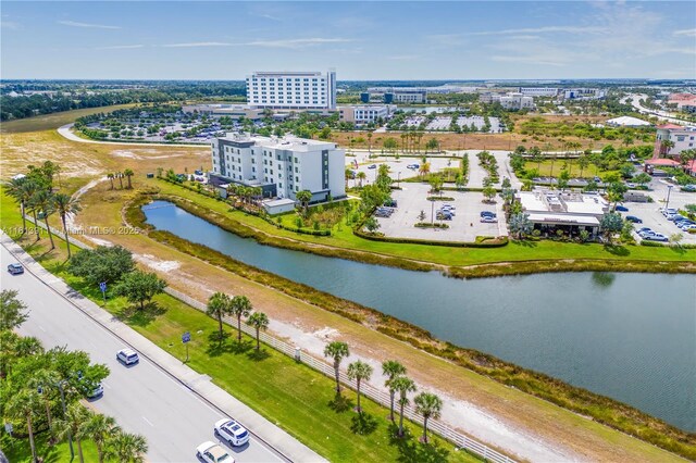 9722 SW Glenbrook Dr, Port St Lucie, FL 34987 - aerial view of a large body of water and apartment complex