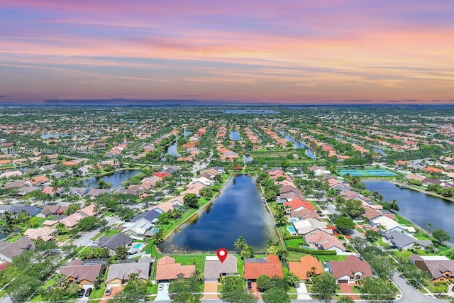 1240 NW 161st Ave, Pembroke Pines, FL 33028 - aerial view of property and surrounding area with a large body of water and nearby suburban area