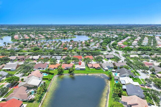 1240 NW 161st Ave, Pembroke Pines, FL 33028 - aerial overview of property's location with a large body of water and nearby suburban area
