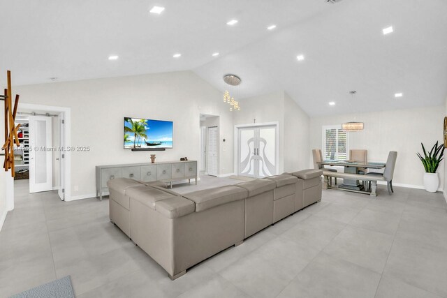 1240 NW 161st Ave, Pembroke Pines, FL 33028 - living area featuring lofted ceiling and baseboards