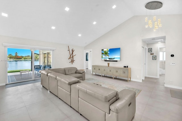 1240 NW 161st Ave, Pembroke Pines, FL 33028 - living room featuring high vaulted ceiling, baseboards, a water view, light tile patterned flooring, and recessed lighting