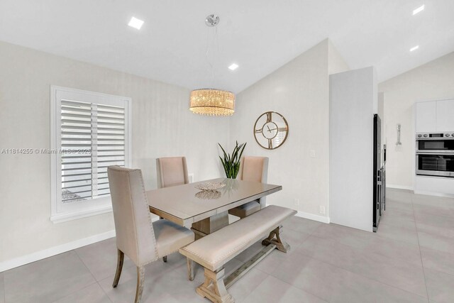 1240 NW 161st Ave, Pembroke Pines, FL 33028 - dining room with light tile patterned floors, baseboards, and a chandelier