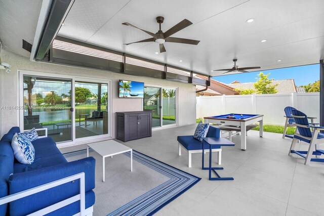1240 NW 161st Ave, Pembroke Pines, FL 33028 - view of patio featuring a ceiling fan and outdoor lounge area