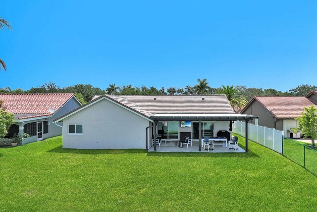 1240 NW 161st Ave, Pembroke Pines, FL 33028 - rear view of property with a patio, stucco siding, and a tile roof