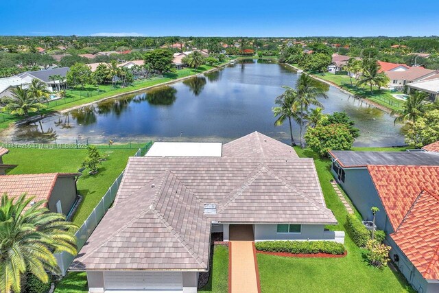 1240 NW 161st Ave, Pembroke Pines, FL 33028 - aerial perspective of suburban area featuring a large body of water