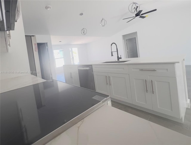 8036 104th Ct, Vero Beach, FL 32967 - kitchen with dishwasher, light countertops, and a ceiling fan