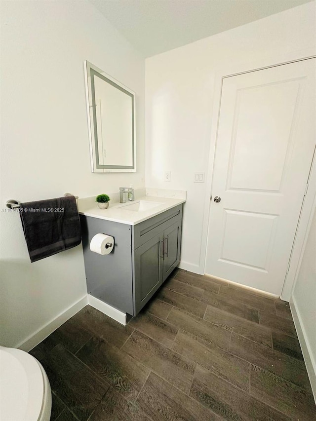 8036 104th Ct, Vero Beach, FL 32967 - half bath with wood tiled floors and vanity