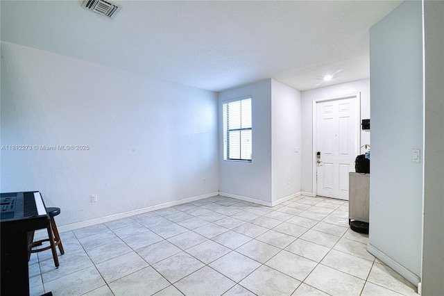 6489 N Anise Ct, Davie, FL 33314 - empty room with light tile patterned flooring, baseboards, and recessed lighting
