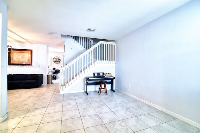 6489 N Anise Ct, Davie, FL 33314 - staircase with tile patterned floors and baseboards