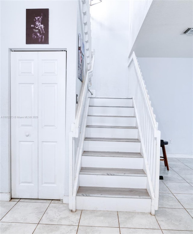 6489 N Anise Ct, Davie, FL 33314 - stairs featuring tile patterned flooring