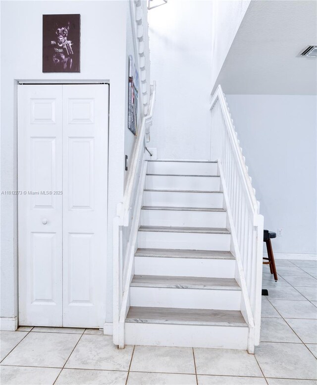 6489 N Anise Ct, Davie, FL 33314 - staircase with tile patterned flooring