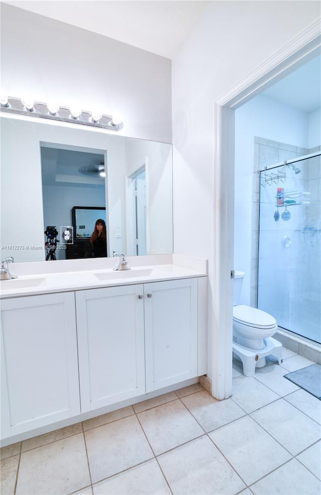 6489 N Anise Ct, Davie, FL 33314 - full bathroom with double vanity, a shower stall, and tile patterned floors