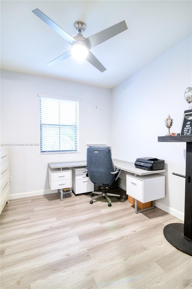 6489 N Anise Ct, Davie, FL 33314 - office with light wood finished floors and a ceiling fan