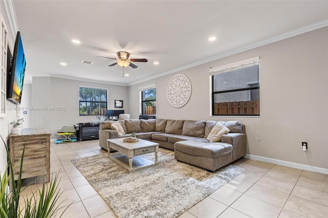 3401 SE 5th St, Homestead, FL 33033 - living room with light tile patterned floors, recessed lighting, ceiling fan, ornamental molding, and baseboards