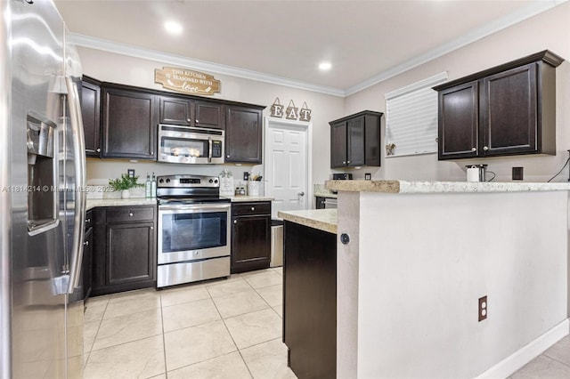 3401 SE 5th St, Homestead, FL 33033 - kitchen with stainless steel appliances, crown molding, dark brown cabinetry, and light tile patterned floors