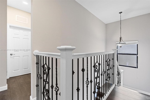 3401 SE 5th St, Homestead, FL 33033 - corridor with dark wood-type flooring, an upstairs landing, and baseboards