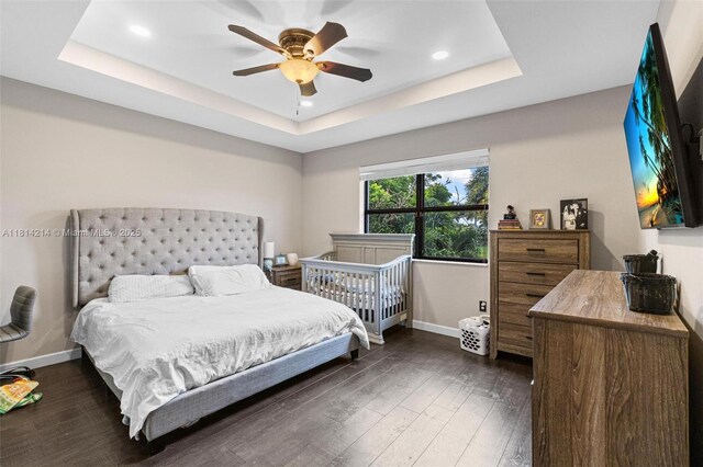 3401 SE 5th St, Homestead, FL 33033 - bedroom with a raised ceiling, baseboards, recessed lighting, dark wood-style flooring, and ceiling fan