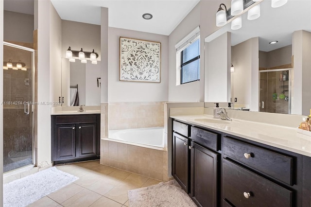 3401 SE 5th St, Homestead, FL 33033 - bathroom with tile patterned floors, a stall shower, and two vanities