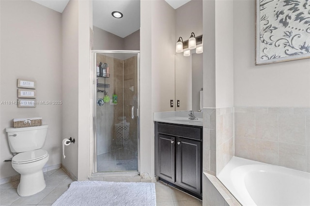 3401 SE 5th St, Homestead, FL 33033 - bathroom with tile patterned flooring, a shower stall, vanity, a garden tub, and toilet