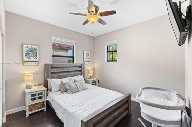 3401 SE 5th St, Homestead, FL 33033 - bedroom with baseboards, dark wood-type flooring, and ceiling fan