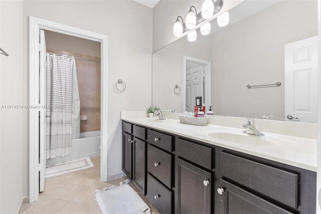 3401 SE 5th St, Homestead, FL 33033 - full bath with double vanity, tile patterned flooring, shower / bath combination with curtain, and baseboards