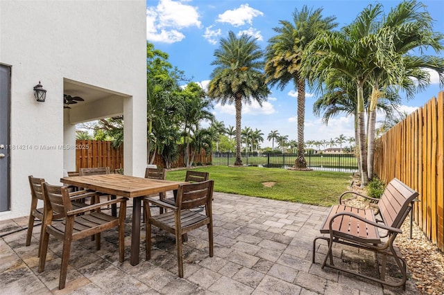 3401 SE 5th St, Homestead, FL 33033 - view of patio / terrace with a water view and outdoor dining area