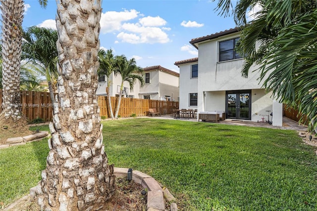 3401 SE 5th St, Homestead, FL 33033 - view of yard with french doors and a patio