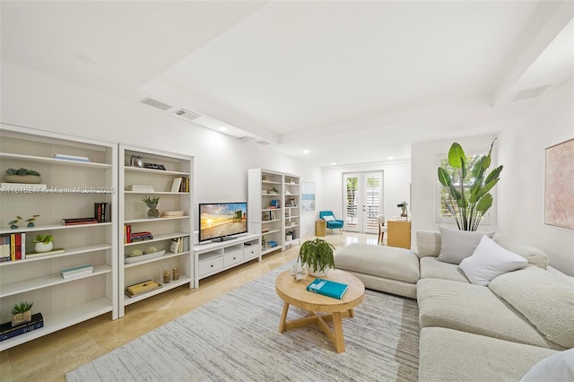615 Santander Ave Unit C, Coral Gables, FL 33134 - living room featuring french doors, recessed lighting, tile patterned floors, and a tray ceiling
