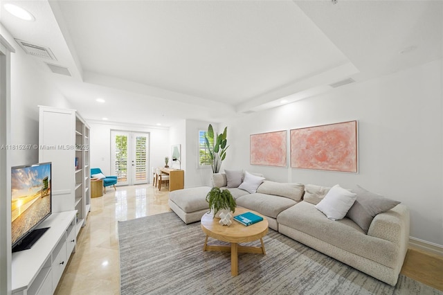 615 Santander Ave Unit C, Coral Gables, FL 33134 - living area with french doors, a tray ceiling, recessed lighting, and light marble finish floors