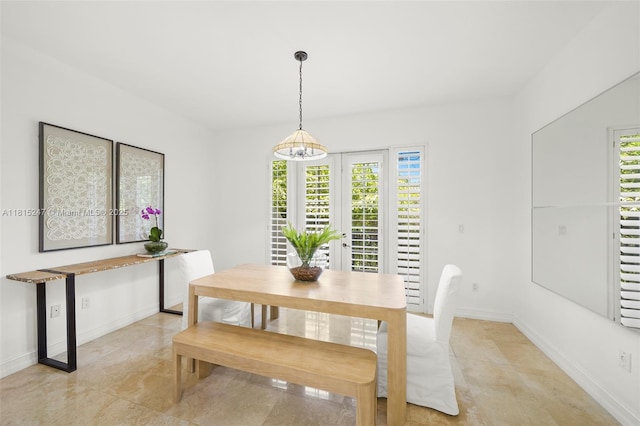 615 Santander Ave Unit C, Coral Gables, FL 33134 - dining area with baseboards and light tile patterned floors