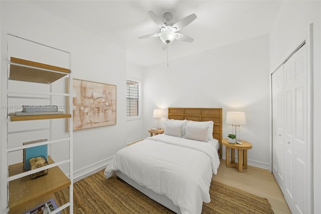 615 Santander Ave Unit C, Coral Gables, FL 33134 - bedroom with a closet, baseboards, a ceiling fan, and wood finished floors