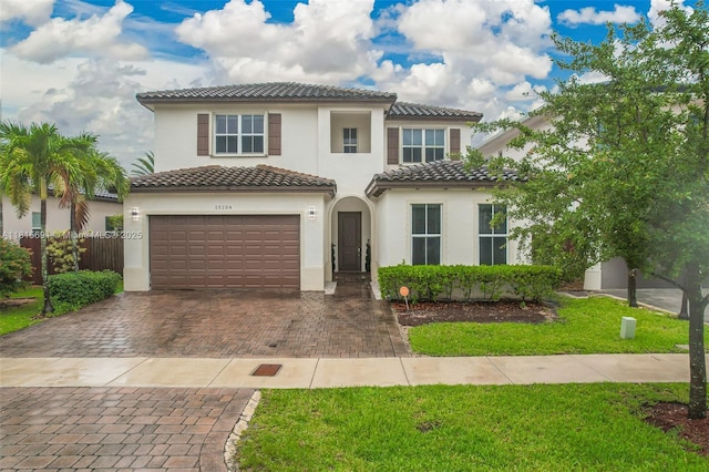 15104 SW 176th St, Miami, FL 33187 - view of front of home with decorative driveway, stucco siding, and a tile roof