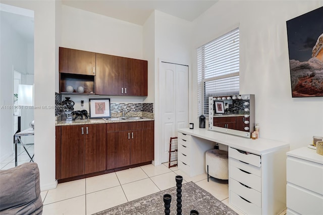 15104 SW 176th St, Miami, FL 33187 - kitchen featuring a sink, light tile patterned floors, tasteful backsplash, a desk, and dark brown cabinets