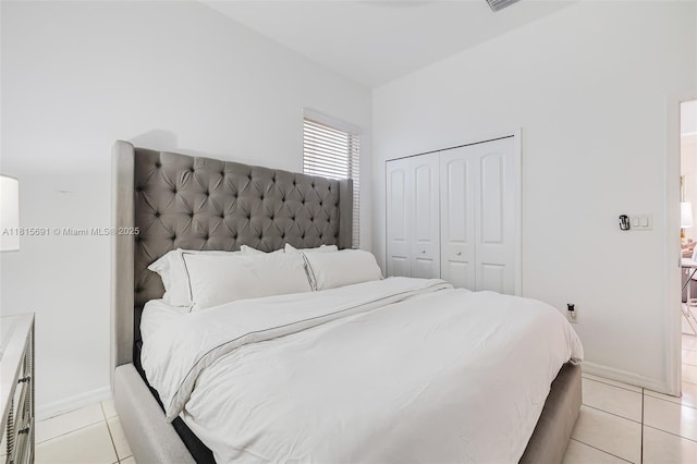 15104 SW 176th St, Miami, FL 33187 - bedroom featuring light tile patterned floors, baseboards, and a closet