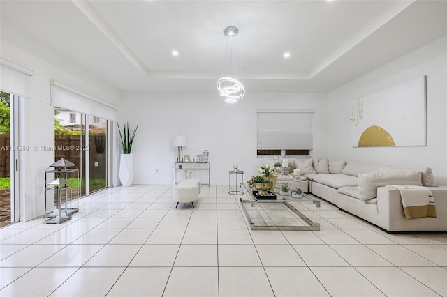 15104 SW 176th St, Miami, FL 33187 - tiled living area featuring a tray ceiling and a chandelier