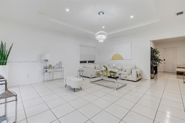 15104 SW 176th St, Miami, FL 33187 - living room with a tray ceiling, recessed lighting, and light tile patterned floors