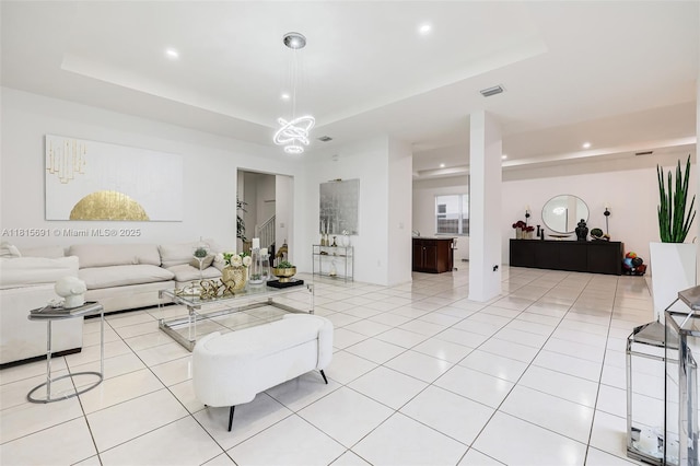 15104 SW 176th St, Miami, FL 33187 - living area with a raised ceiling, recessed lighting, a chandelier, and light tile patterned flooring