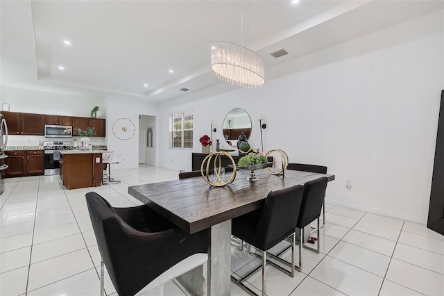 15104 SW 176th St, Miami, FL 33187 - dining area with a raised ceiling, light tile patterned floors, a chandelier, and recessed lighting