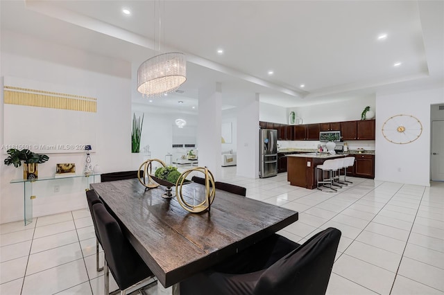 15104 SW 176th St, Miami, FL 33187 - dining room featuring a tray ceiling, light tile patterned floors, and recessed lighting