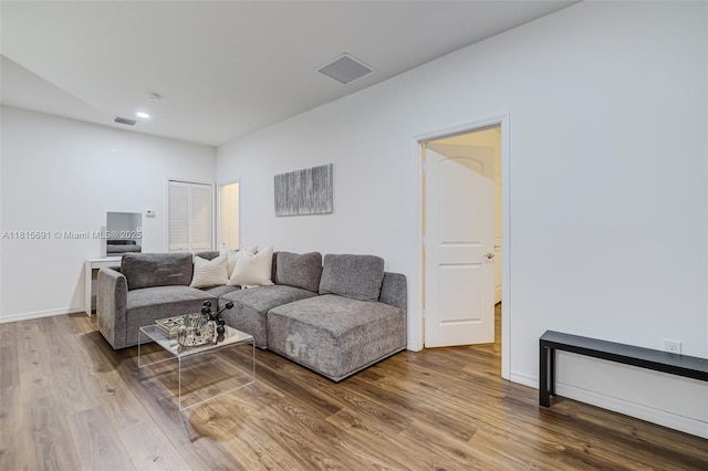 15104 SW 176th St, Miami, FL 33187 - living area featuring wood finished floors, recessed lighting, and baseboards