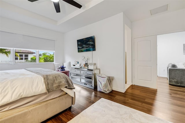 15104 SW 176th St, Miami, FL 33187 - bedroom featuring dark wood-type flooring, a tray ceiling, and a ceiling fan