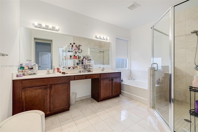 15104 SW 176th St, Miami, FL 33187 - bathroom with a garden tub, double vanity, a stall shower, and tile patterned flooring