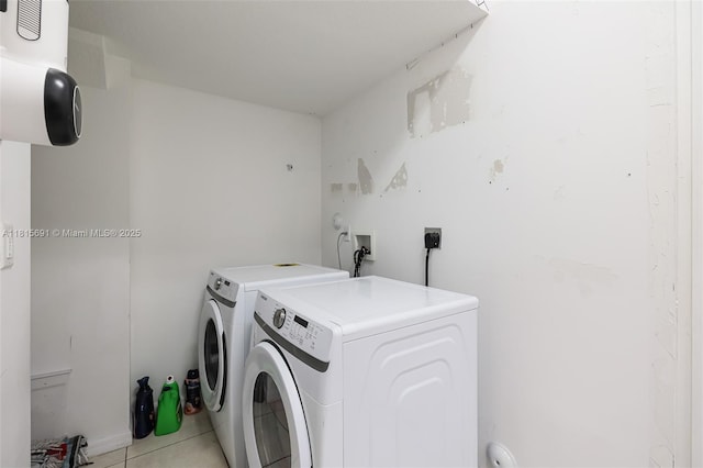 15104 SW 176th St, Miami, FL 33187 - laundry room with independent washer and dryer and light tile patterned floors