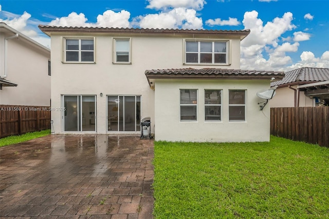 15104 SW 176th St, Miami, FL 33187 - rear view of property featuring stucco siding and a patio area
